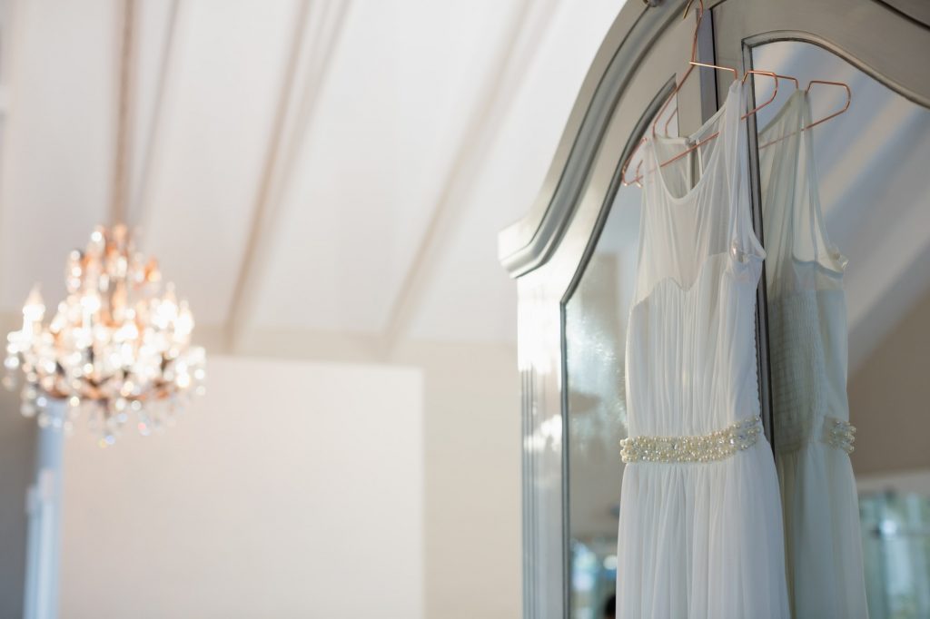 Wedding dress hanging in hanger